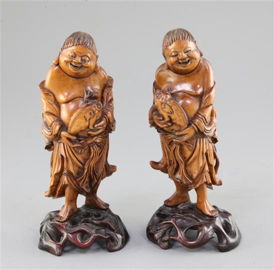 A pair of Chinese boxwood figures of Liu Hai, 19th century, height 21cm